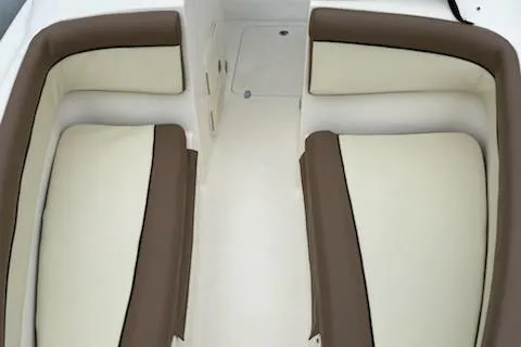 Slide: The Image of 2018 Scout Dorado 210 boat interior with beige and brown seating. - 6