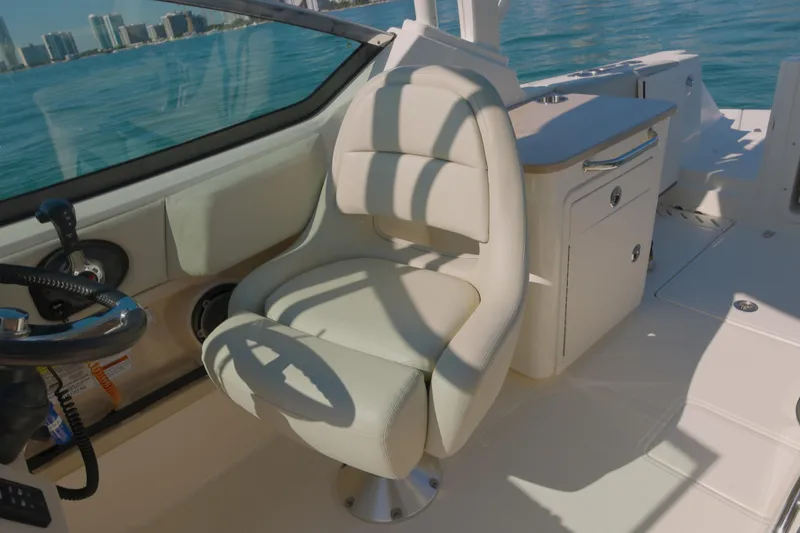 Slide: The Image of Interior of 2022 Boston Whaler 240 Vantage boat with helm seat and console. - 10