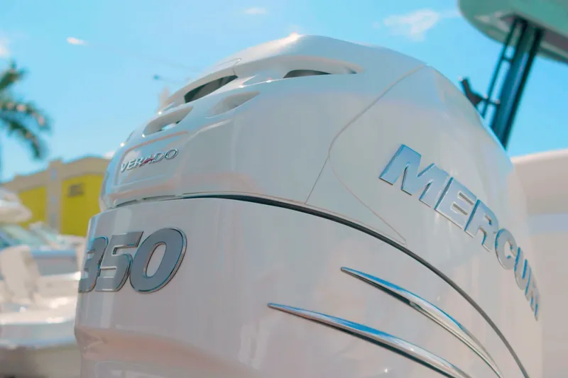 Slide: The Image of 2022 Boston Whaler 240 Vantage with Mercury Verado 350 engine, sunny day background. - 17