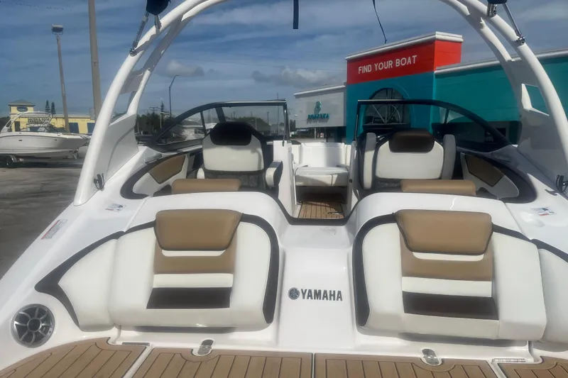 Slide: The Image of 2022 Yamaha Boats 212SE interior with stylish seating and modern design. - 3