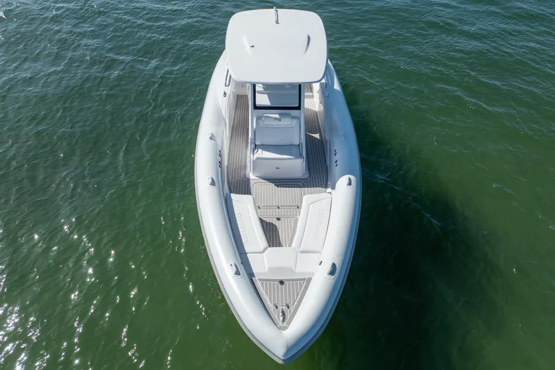 Slide: The Image of Aerial view of 2025 Airship 340 boat on calm water. - 10