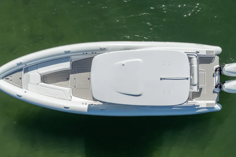 Slide: The Image of Overhead view of 2025 Airship 340 boat on green water. - 11