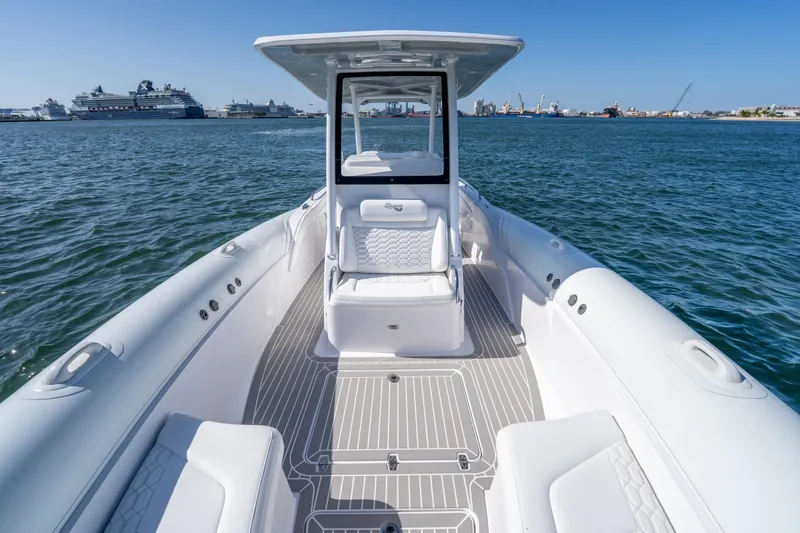 Slide: The Image of 2025 Airship 340 boat on water, featuring sleek design and spacious deck. - 26