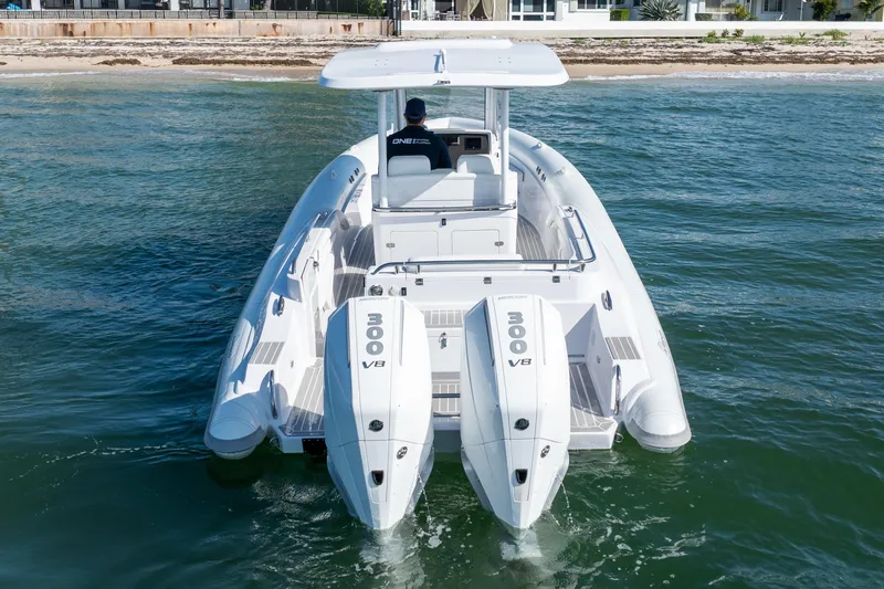 Slide: The Image of 2025 Airship 340 boat with dual 300 V8 engines on the water. - 3