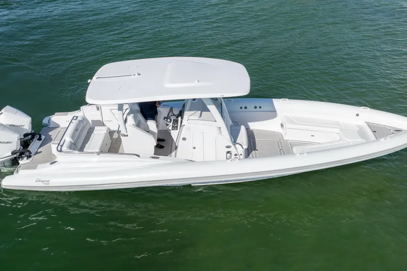 Slide: The Image of 2025 Airship 340 boat on water, featuring sleek design and modern amenities. - 8