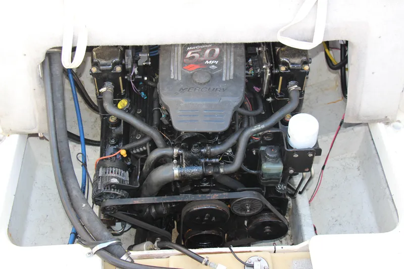 Slide: The Image of Engine compartment of a 2004 Maxum 2400 SR boat with Mercury 5.0 MPI engine. - 19