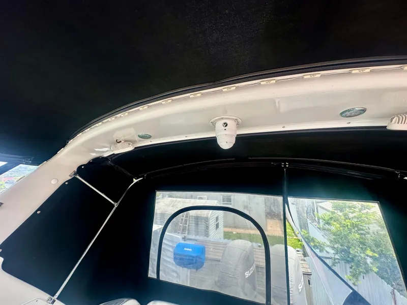 Slide: The Image of Interior view of 2001 Regal Commodore 2760 boat with canopy and equipment. - 30