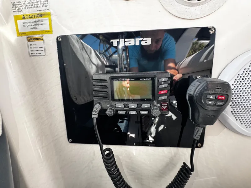 Slide: The Image of Tiara Yachts 3500 Open 2000 model with marine radio and microphone setup. - 25