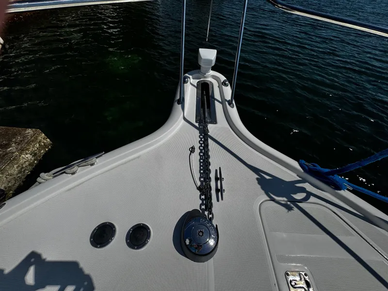Slide: The Image of Bow of 2000 Tiara Yachts 3500 Open with anchor chain and water view. - 28
