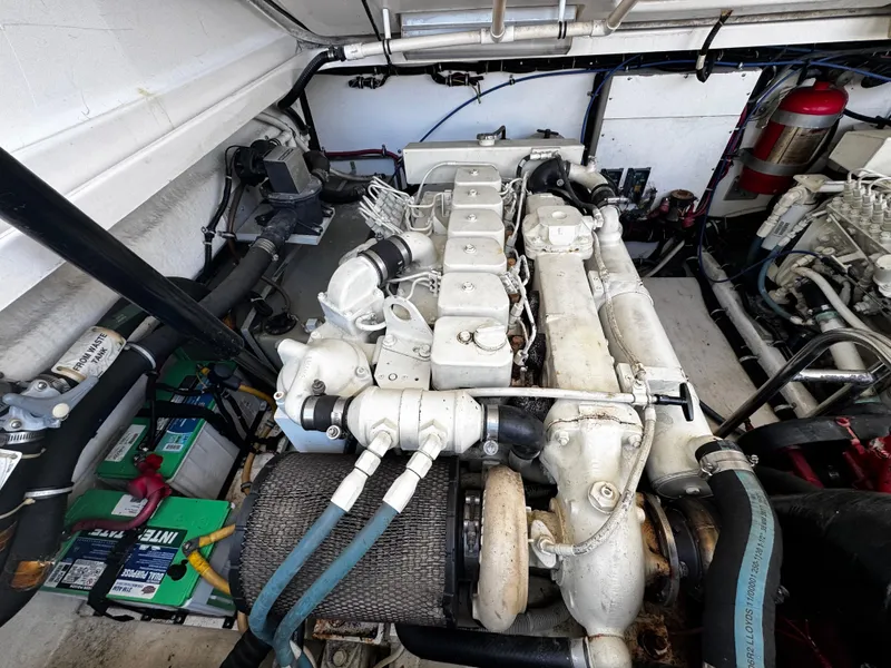 Slide: The Image of Engine compartment of 2000 Tiara Yachts 3500 Open, showcasing detailed mechanical components. - 45