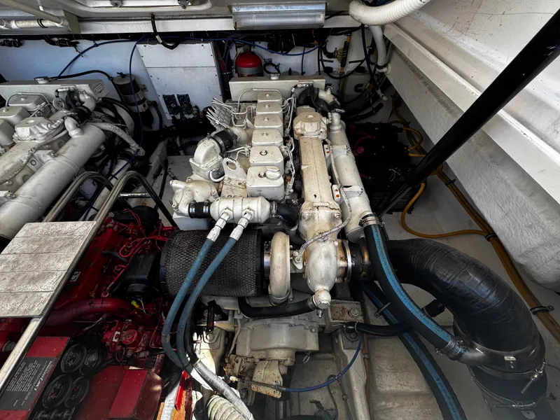 Slide: The Image of Engine compartment of a 2000 Tiara Yachts 3500 Open, showcasing mechanical components. - 46