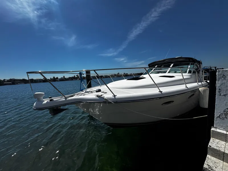 Slide: The Image of 2000 Tiara Yachts 3500 Open docked on a sunny day. - 5