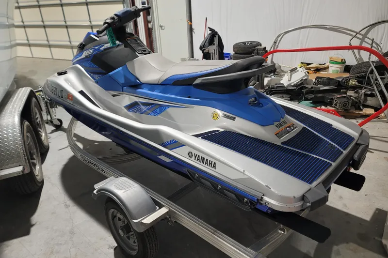 Slide: The Image of 2020 Yamaha WaveRunner EX Deluxe on trailer in garage setting. - 8