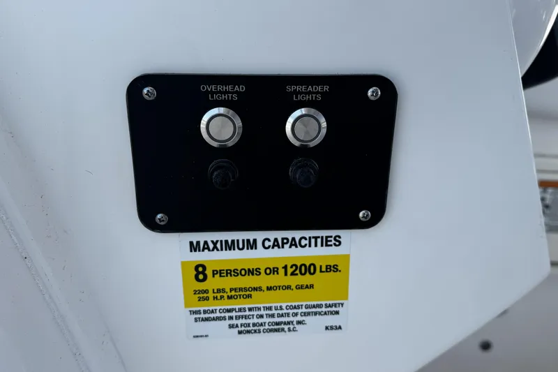 Slide: The Image of 2026 Sea Fox 228 Traveler boat dashboard with steering wheel and controls. - 11