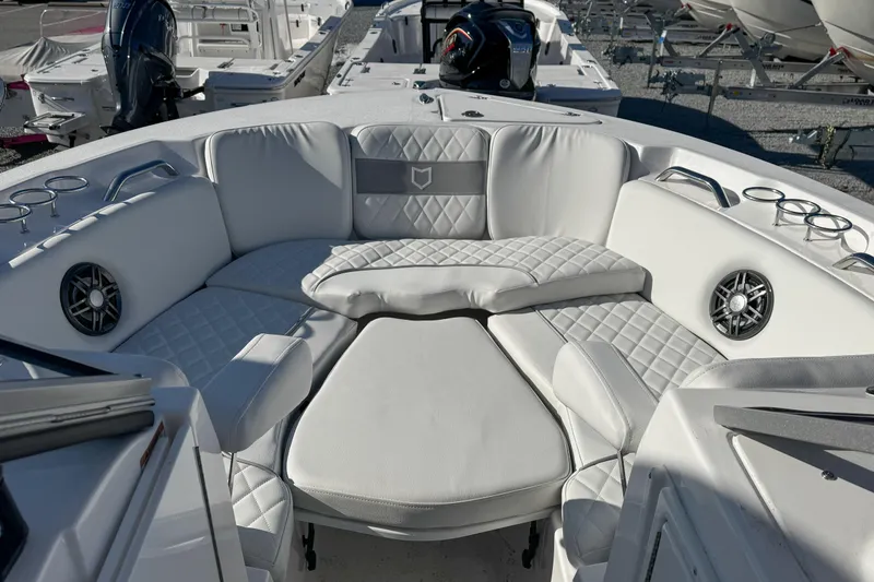Slide: The Image of 2026 Sea Fox 228 Traveler with Yamaha outboard motors, displayed on gravel lot. - 16