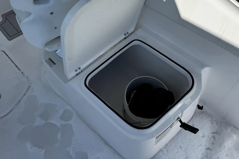 Slide: The Image of 2026 Sea Fox 228 Traveler boat interior cabin with open door and seating. - 18