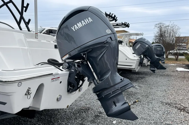 Slide: The Image of Luxurious seating area on 2026 Sea Fox 228 Traveler boat with quilted upholstery and cup holders. - 2