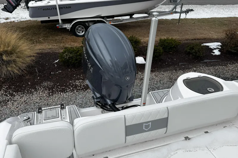 Slide: The Image of 2026 Sea Fox 228 Traveler boat interior with cushioned seating and storage compartments. - 4