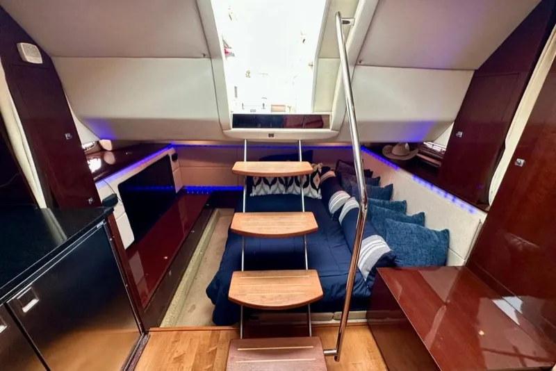 Slide: The Image of Luxurious interior of 2011 Sea Ray 450 Sundancer yacht with modern design and cozy seating. - 20