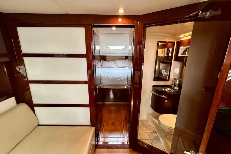 Slide: The Image of Luxurious interior of 2011 Sea Ray 450 Sundancer yacht with bedroom and bathroom. - 5