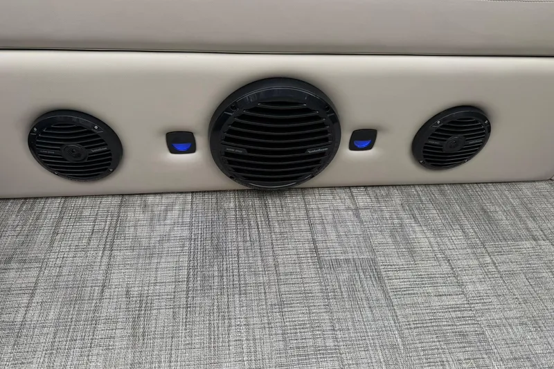 Slide: The Image of 2026 Bentley Pontoons Elite 253 Swingback speakers and interior detail. - 11