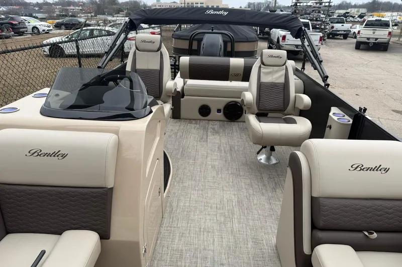 Slide: The Image of 2026 Bentley Pontoons Elite 253 Swingback interior with luxurious seating and modern design. - 12