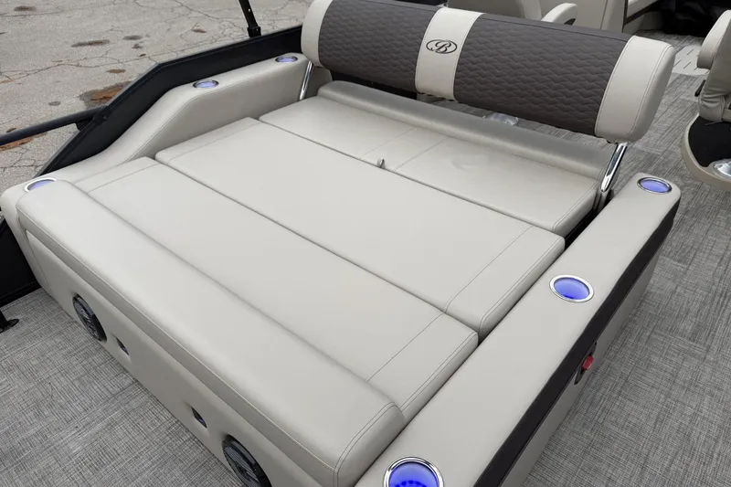 Slide: The Image of 2026 Bentley Pontoons Elite 253 Swingback with luxurious seating and integrated cup holders. - 15