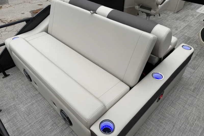 Slide: The Image of 2026 Bentley Pontoons Elite 253 Swingback with luxurious seating and illuminated cup holders. - 17