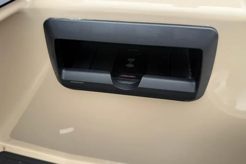 Slide: The Image of 2026 Bentley Pontoons Elite 253 Swingback wireless charging station detail. - 7