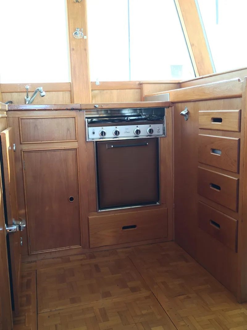 Slide: The Image of Galley area of a 1982 Grand Banks 42 Europa yacht. - 26