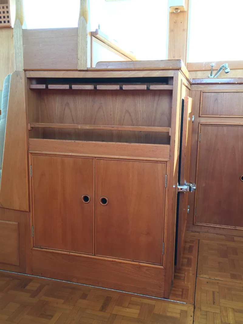 Slide: The Image of Interior of 1982 Grand Banks 42 Europa yacht with wooden cabinetry. - 27