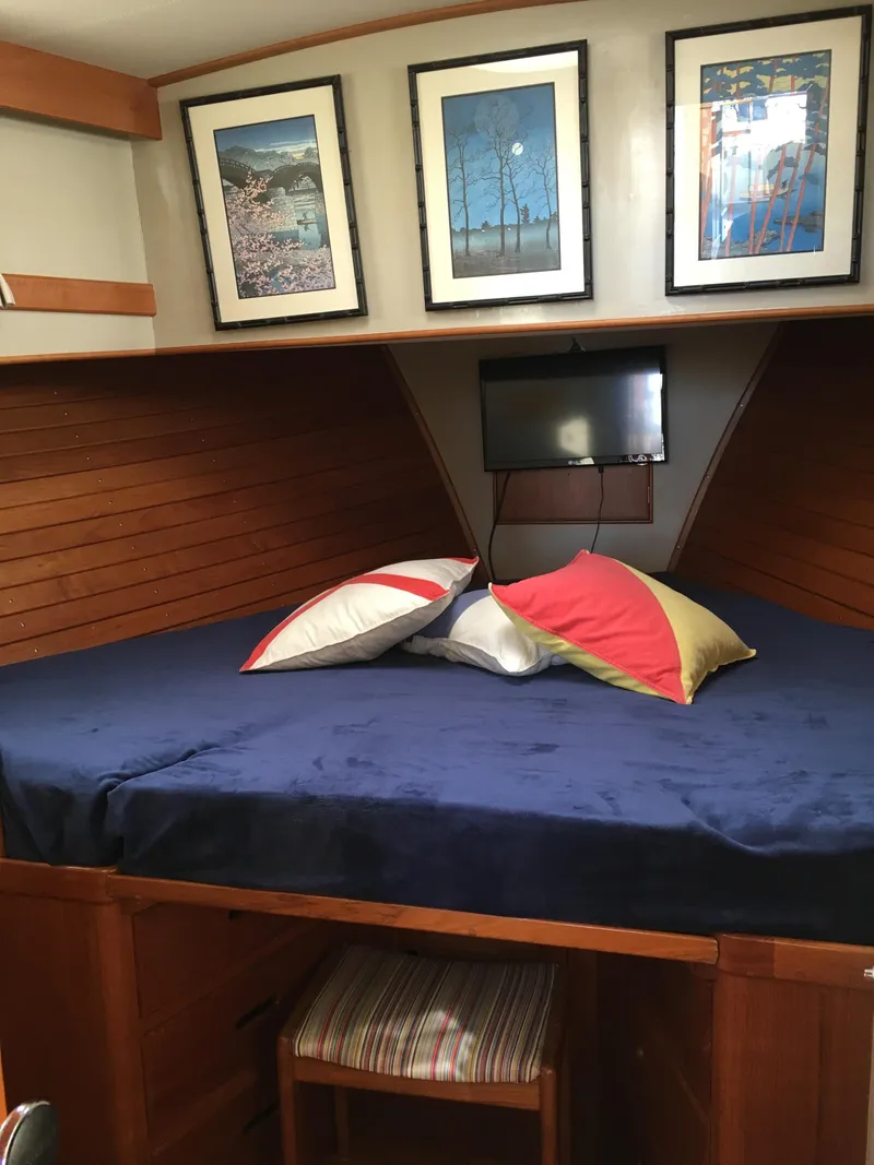 Slide: The Image of Interior of a 1982 Grand Banks 42 Europa with cozy bed. - 35