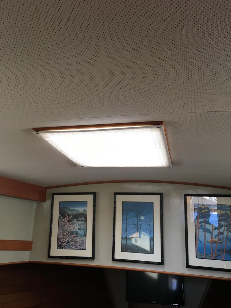 Slide: The Image of Interior of 1982 Grand Banks 42 Europa with artwork. - 48