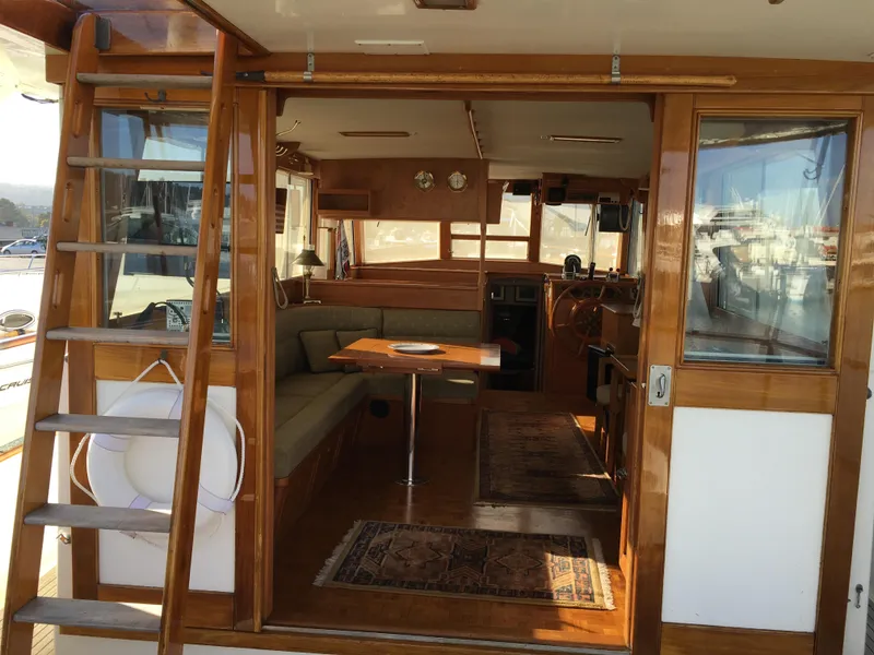 Slide: The Image of Interior of a 1982 Grand Banks 42 Europa yacht with wooden finish. - 5