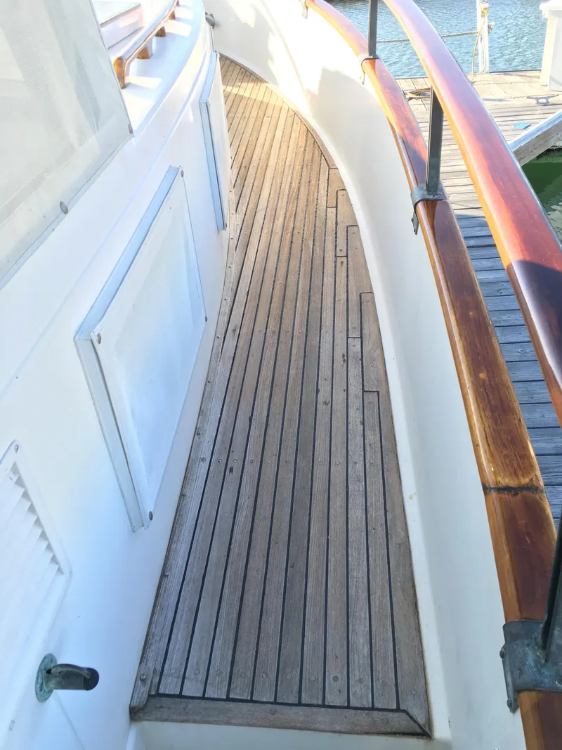 Slide: The Image of Teak deck of a 1982 Grand Banks 42 Europa boat. - 7