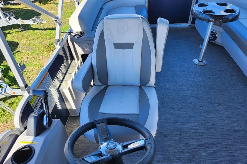 Slide: The Image of Captain's chair and helm of 2022 Godfrey Sweetwater 2286 SFL pontoon boat. - 24