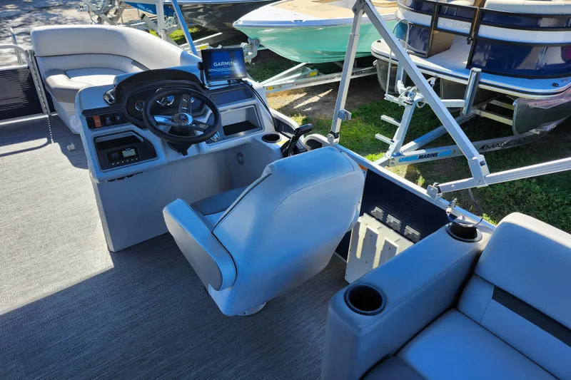 Slide: The Image of Interior of 2022 Godfrey Sweetwater 2286 SFL pontoon boat with steering console and seating. - 27