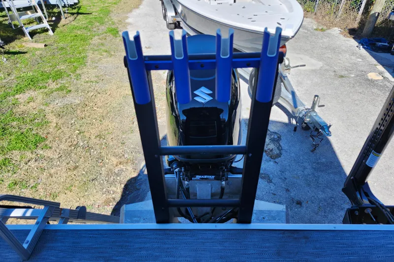 Slide: The Image of Rear view of a 2022 Godfrey Sweetwater 2286 SFL boat with Suzuki outboard motor. - 35