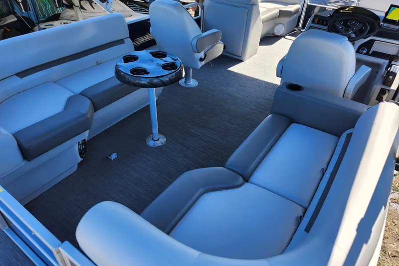 Slide: The Image of 2022 Godfrey Sweetwater 2286 SFL pontoon boat interior with plush seating and cup holders. - 36