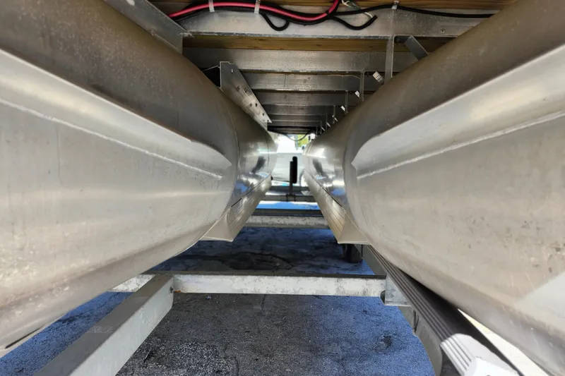 Slide: The Image of Underneath view of 2022 Godfrey Sweetwater 2286 SFL pontoon boat, showcasing aluminum pontoons. - 42