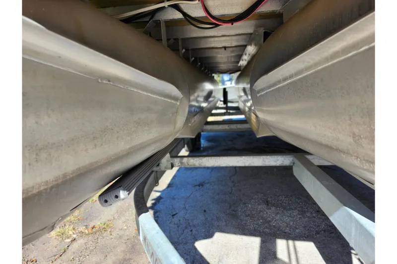 Slide: The Image of Underneath view of 2022 Godfrey Sweetwater 2286 SFL pontoon boat on trailer. - 43