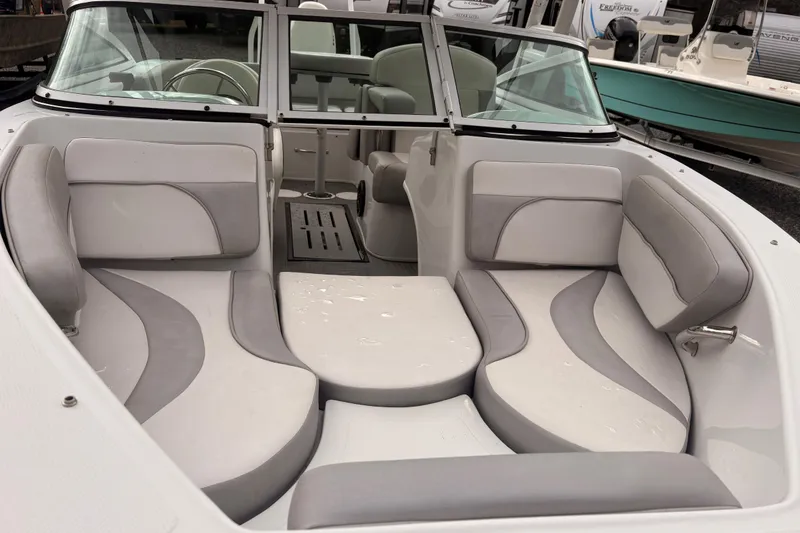 Slide: The Image of 2020 Caravelle 19 EBo Fish & Ski boat interior with gray and white seating. - 6