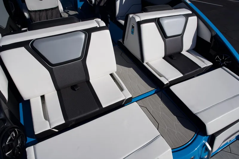 Slide: The Image of 2023 Yamaha Boats 255XD interior seating, featuring modern design and comfortable upholstery. - 11