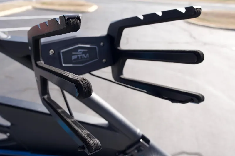 Slide: The Image of Wakeboard rack on 2023 Yamaha Boats 255XD, featuring PTM branding. - 15