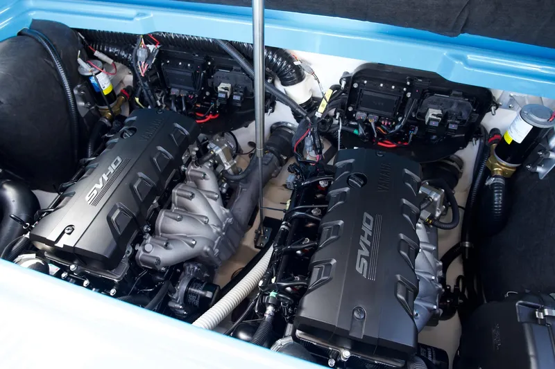 Slide: The Image of 2023 Yamaha Boats 255XD engine compartment with dual SVHO engines. - 6