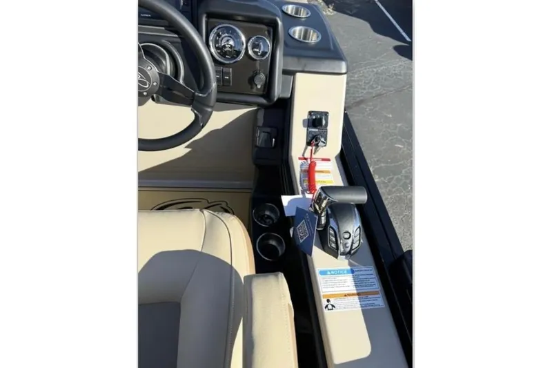 Slide: The Image of 2025 Veranda VR25RC XL boat dashboard with steering wheel and control panel. - 9