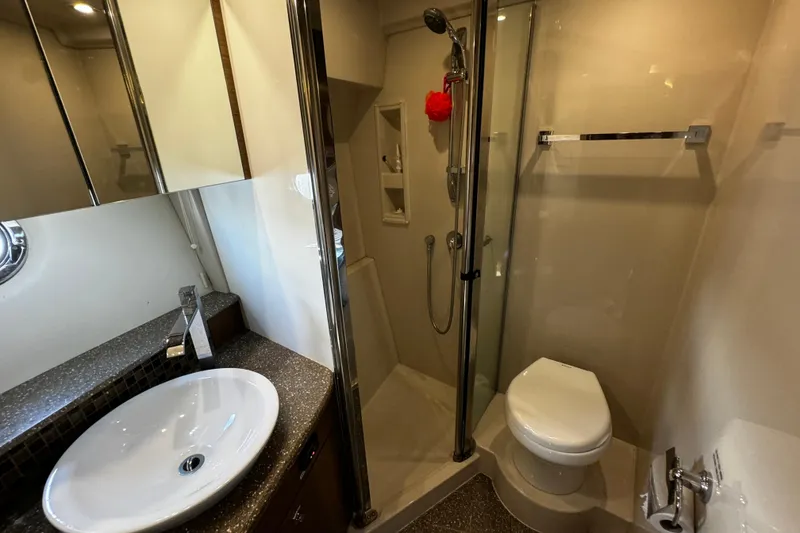 Slide: The Image of Luxurious bathroom in 2014 Cruisers Yachts 45 Cantius with modern fixtures and shower. - 18