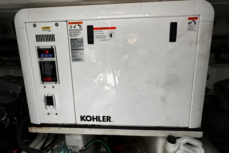 Slide: The Image of Kohler generator in 2014 Cruisers Yachts 45 Cantius engine room. - 24