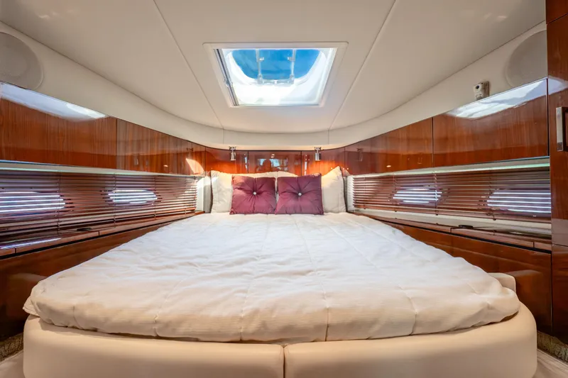 Slide: The Image of Luxurious cabin interior of 2009 Sea Ray 470 Sundancer yacht with skylight. - 33