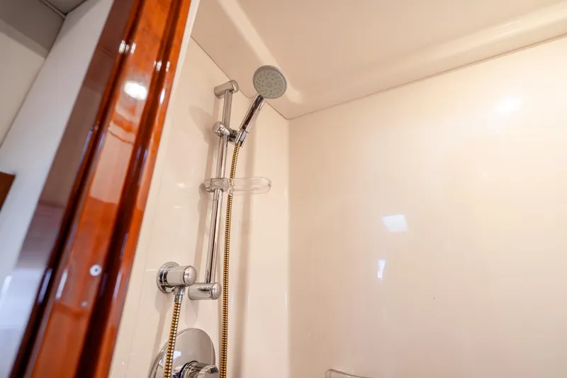 Slide: The Image of Shower area inside 2009 Sea Ray 470 Sundancer yacht, featuring modern fixtures. - 41